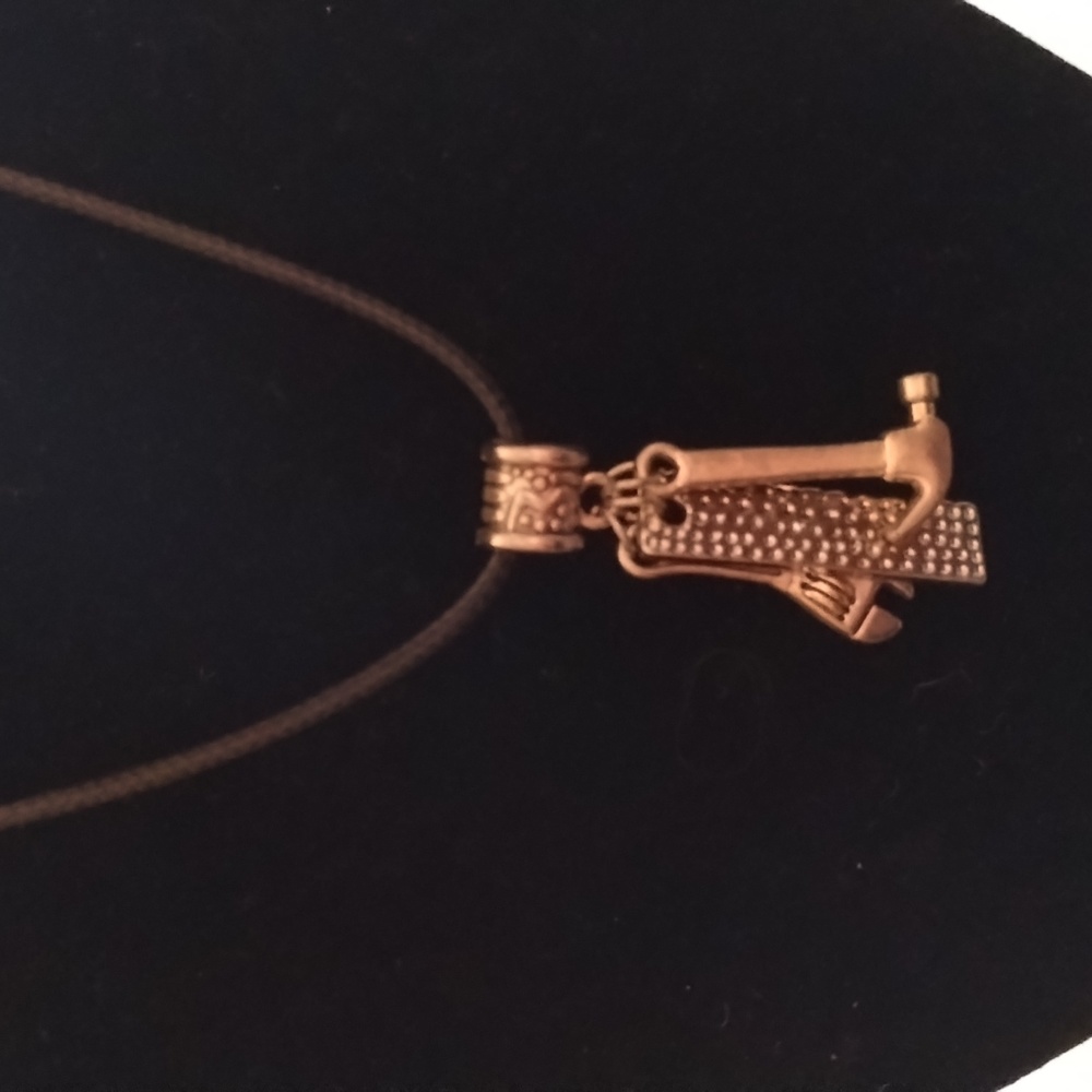 Men's black cord necklace with charms